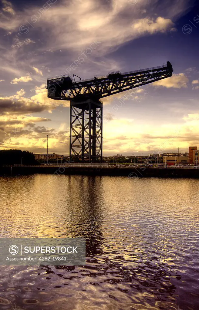 Scotland, Glasgow, Finnieston Crane. Golden sunset at the Finnieston Crane in Glasgow.