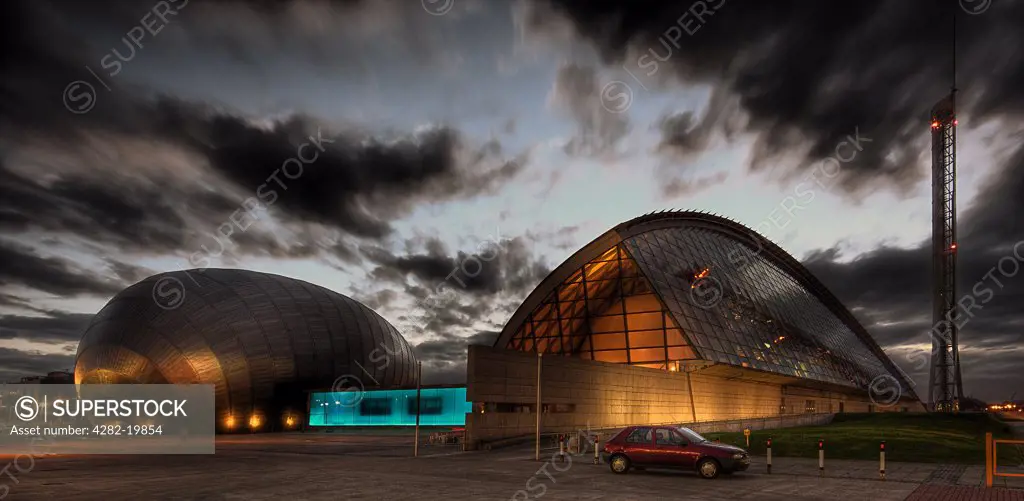 Scotland, Glasgow, Glasgow Science Centre. The IMAX cinema and Glasgow Science Centre at sunset.