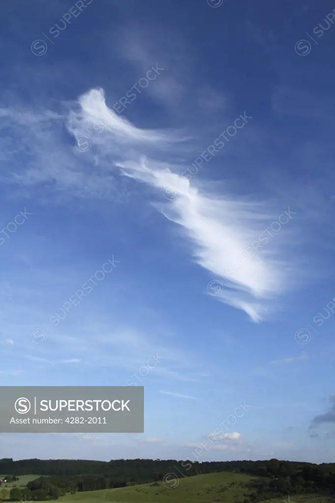 England, Buckinghamshire, Chiltern Hills. A whispy Cirrus cloud above the Chiltern Hills.