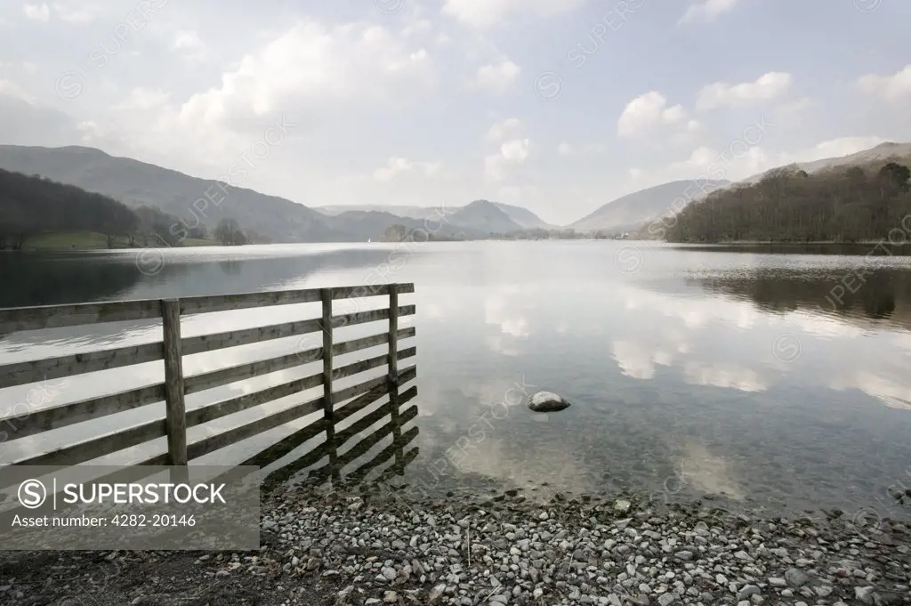 England, Cumbria, Grasmere. A view over Grasmere lake. The lake lies to the south of Grasmere village in the heart of the Lake District and was once the home of the famous poet William Wordsworth.