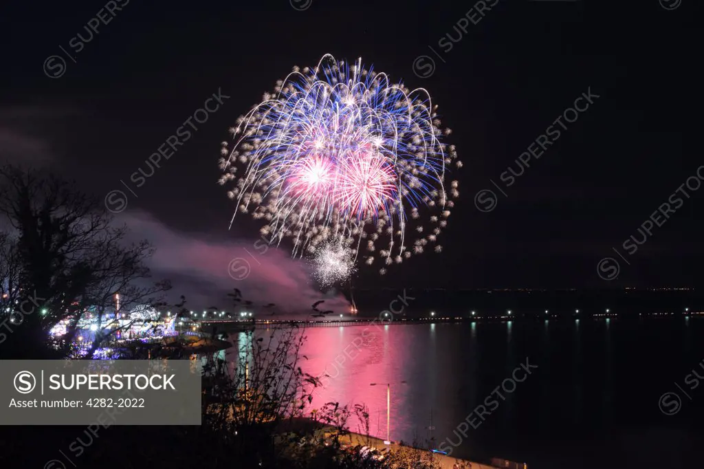 England, Essex, Southend-on-Sea. Firework display on the sea front at Southend-on-Sea.