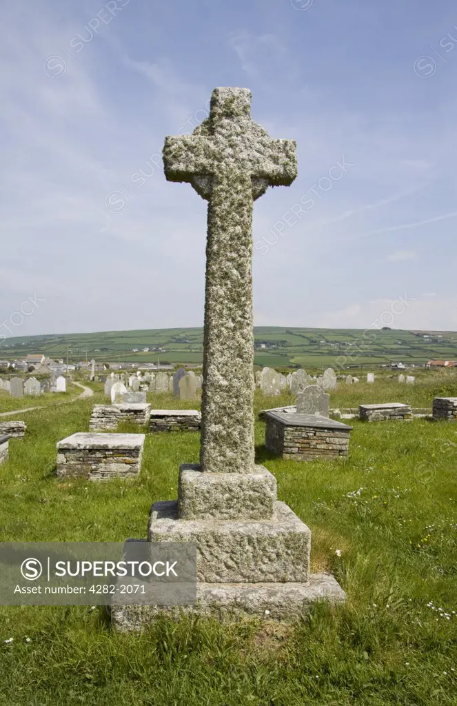 England, Cornwall, Tintagel. A stone cross in a churchyard near Tintagel.