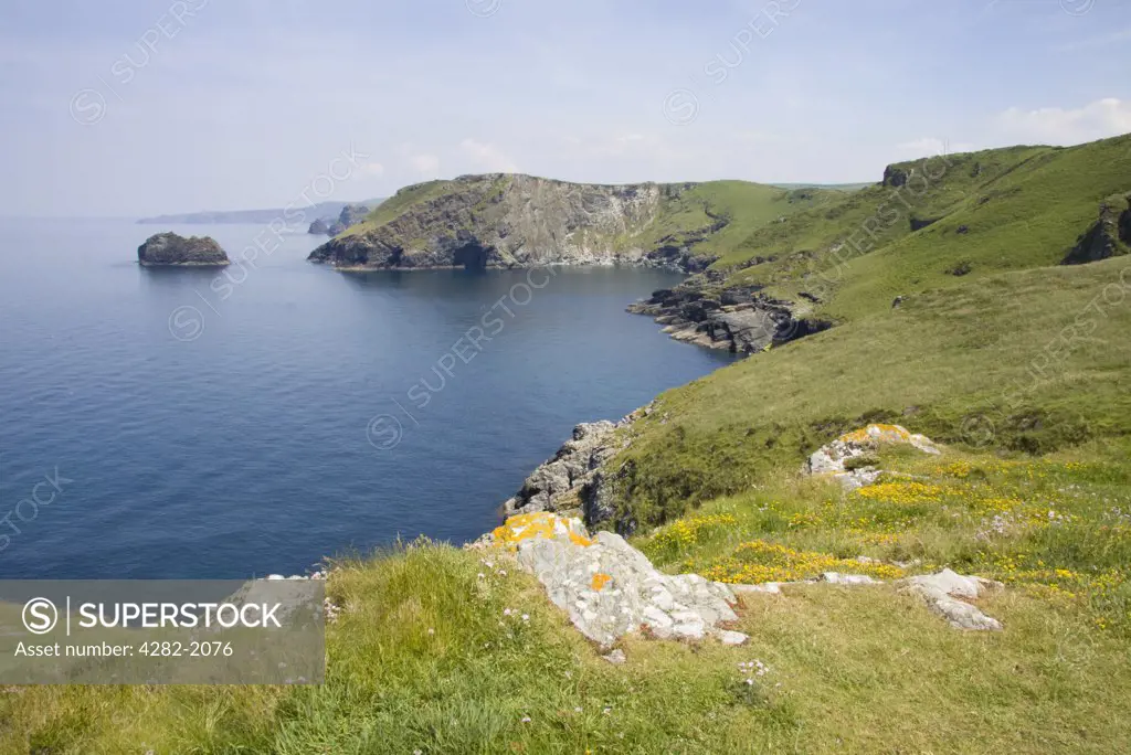 England, Cornwall, Barras Nose. A view along the North Cornwall coastline from Barras Nose towards The Sisters islands.