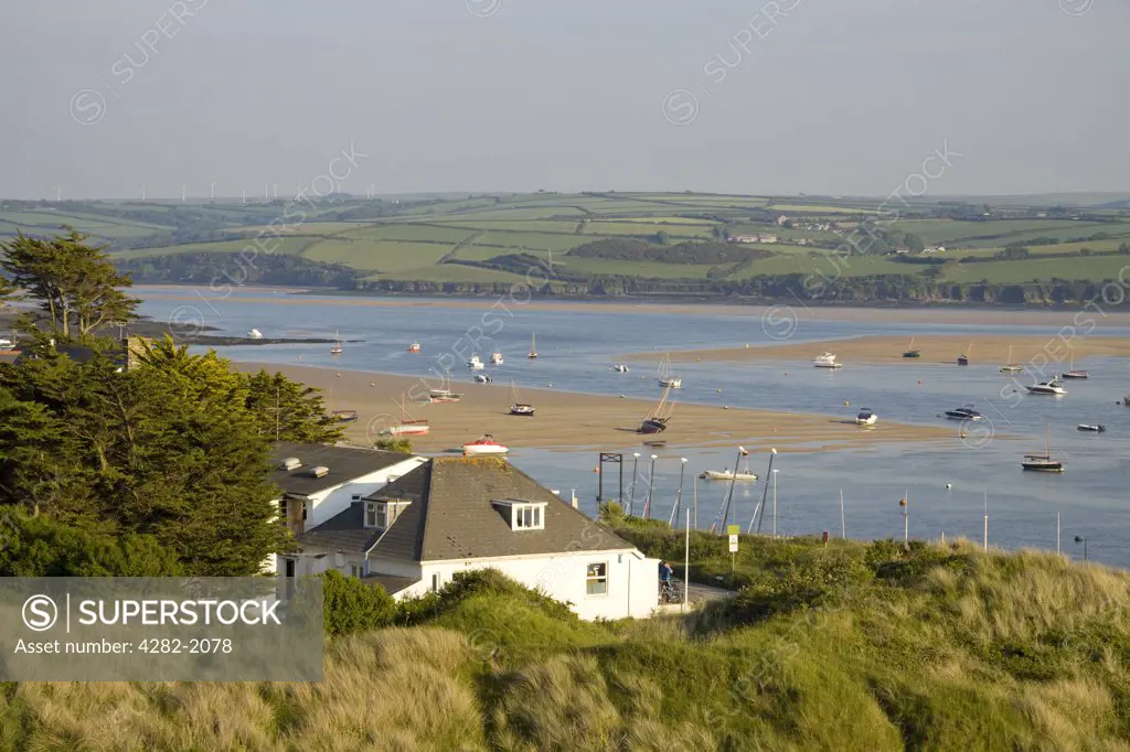 England, Cornwall, Padstow. Small boats in the estuary of the River Camel between Rock and Padstow in North Cornwall.