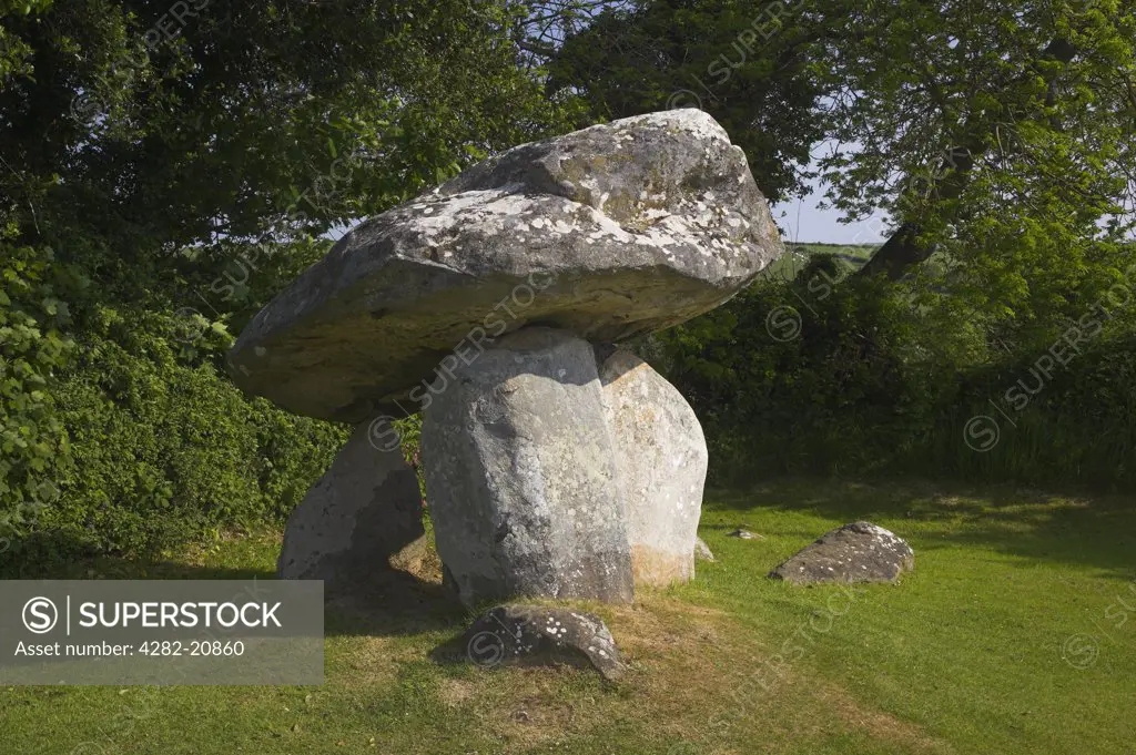 Wales, Pembrokeshire/ Sir Benfro, Newport. Carreg Coetan Arthur, a Neolithic chambered tomb dating back to over 5000 years, now part of the site of holiday village.