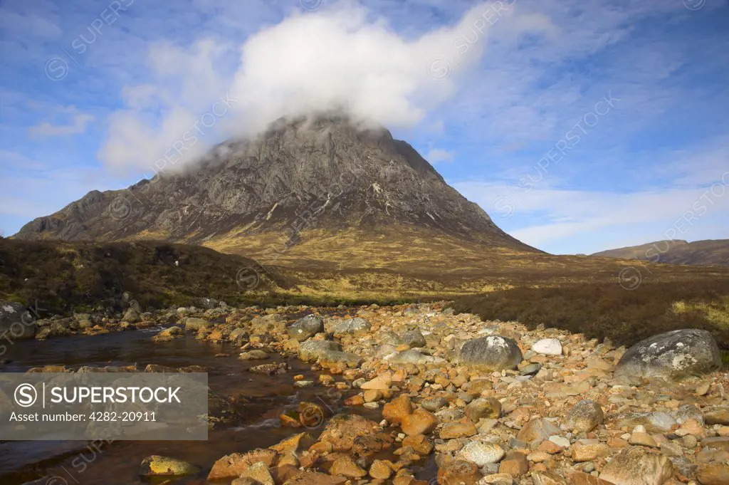 Scotland, Highland, Glen Etive. Low Cloud on the mountain top of Buachaille Etive Mor, one of the most recognisable mountains in Scotland.