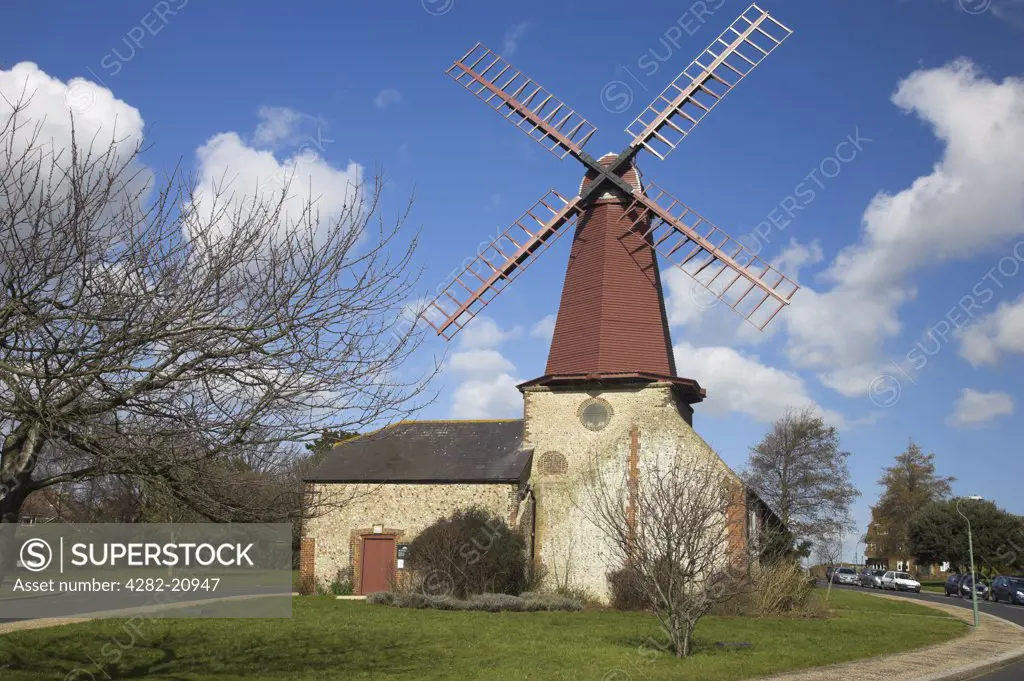 England, City of Brighton and Hove, West Blatchington. West Blatchington Windmill, an unusual Smock Mill built on a Barn Complex in 1820 and ceasing work about 1900, near Brighton.