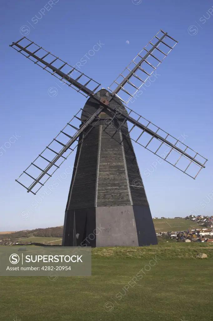 England, City of Brighton and Hove, Rottingdean. Rottingdean Windmill is a black smock mill built in 1802, situated above the village of Rottingdean to the west of Brighton.