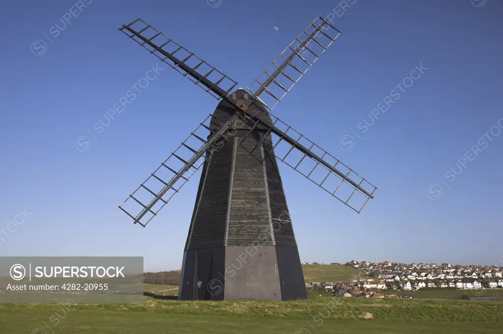 England, City of Brighton and Hove, Rottingdean. Rottingdean Windmill is a black smock mill built in 1802, situated above the village of Rottingdean to the west of Brighton.