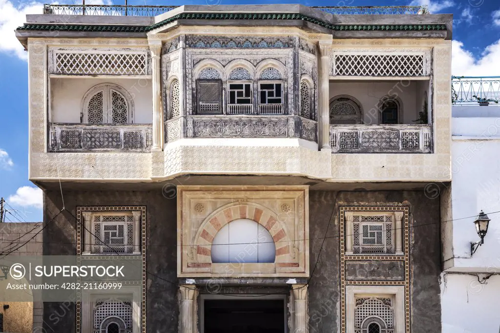 Ornate carved stucco facade of an Arabian house in Sousse in Tunisia.