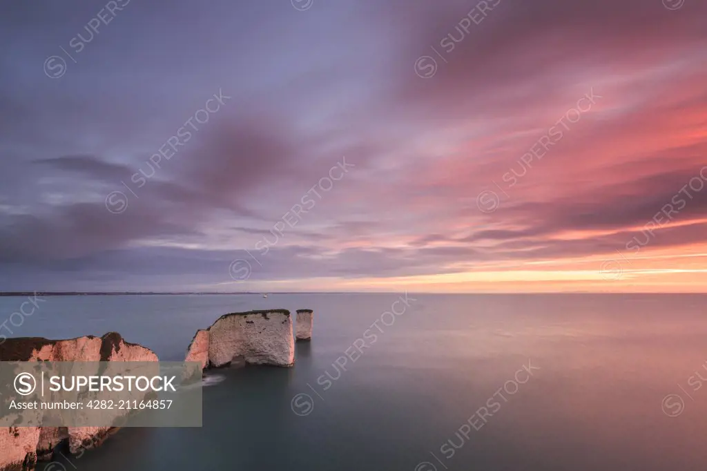 A colourful sunrise at Old Harry Rocks.
