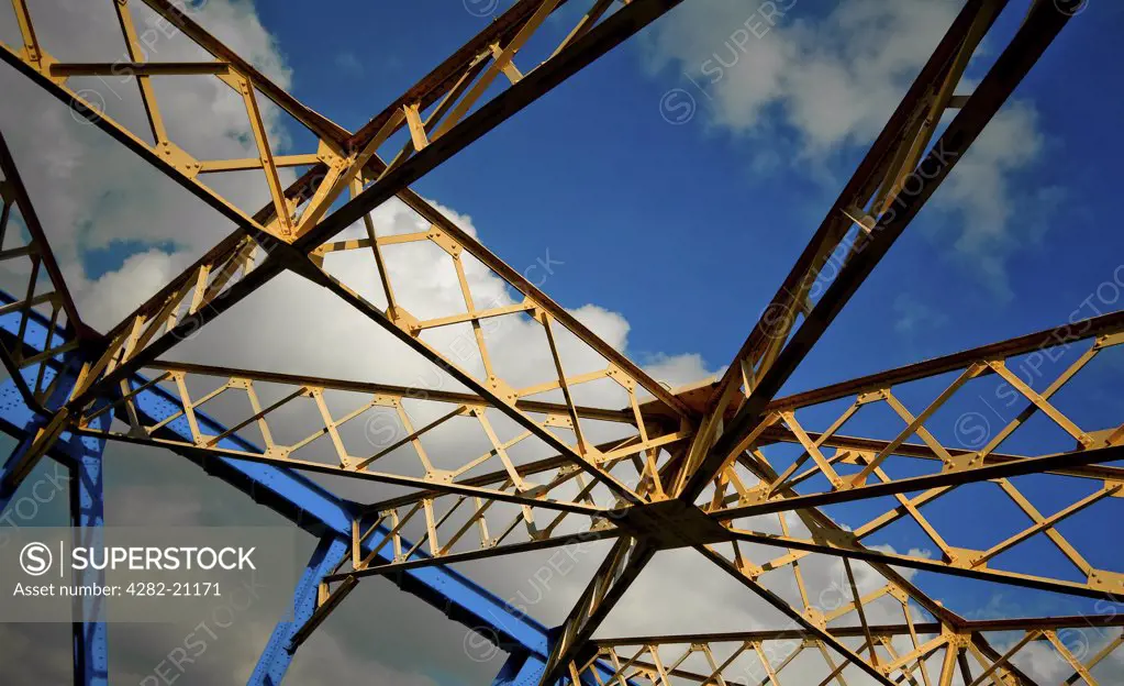 England, East Yorkshire, Kingston Upon Hull. Looking up to a blue sky through girders of the Drypool Bridge in Kingston Upon Hull.