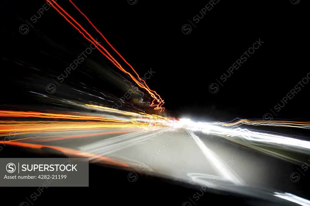 England, London, M1 Motorway. A view from a moving car to light trails on the M1 motorway at night.