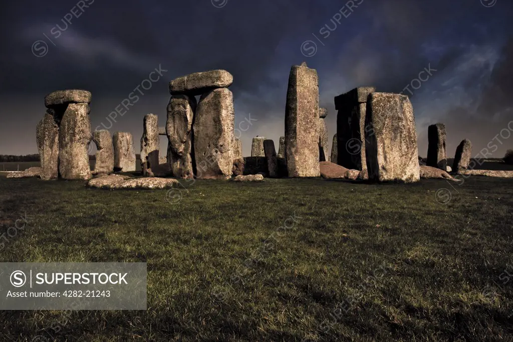 England, Wiltshire, Stonehenge. Dark clouds over the ancient Stonehenge in Wiltshire.