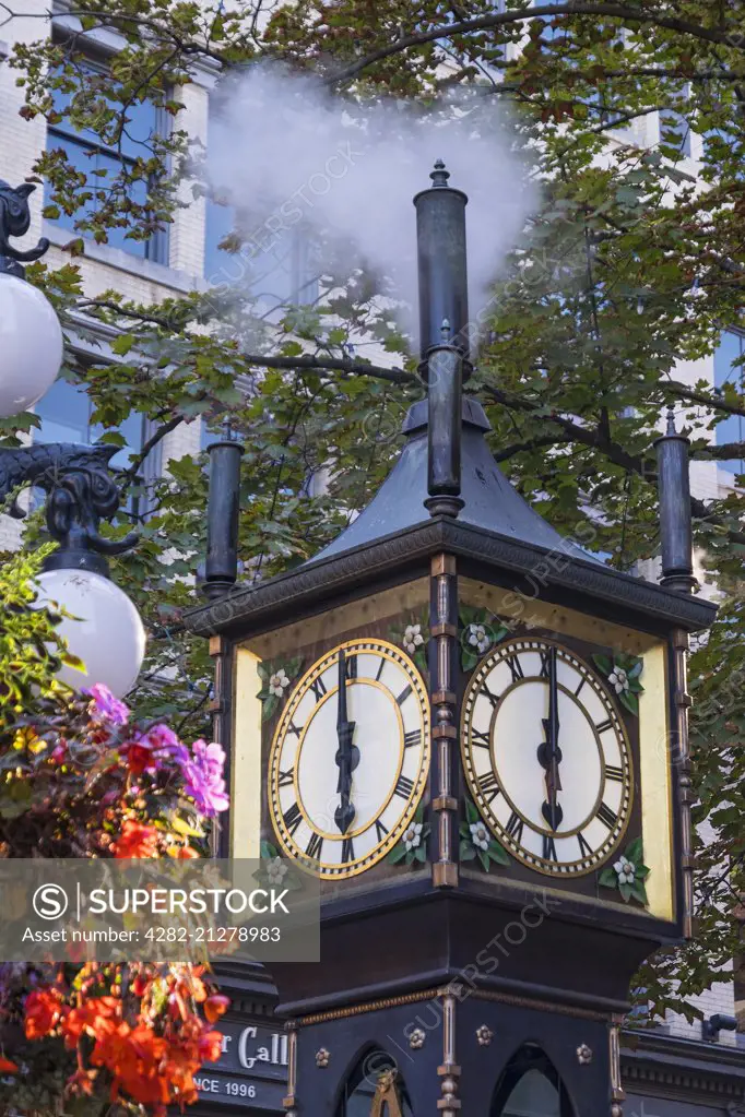 Steam emanates from the Gastown steam clock as it strikes 6pm in Vancouver.