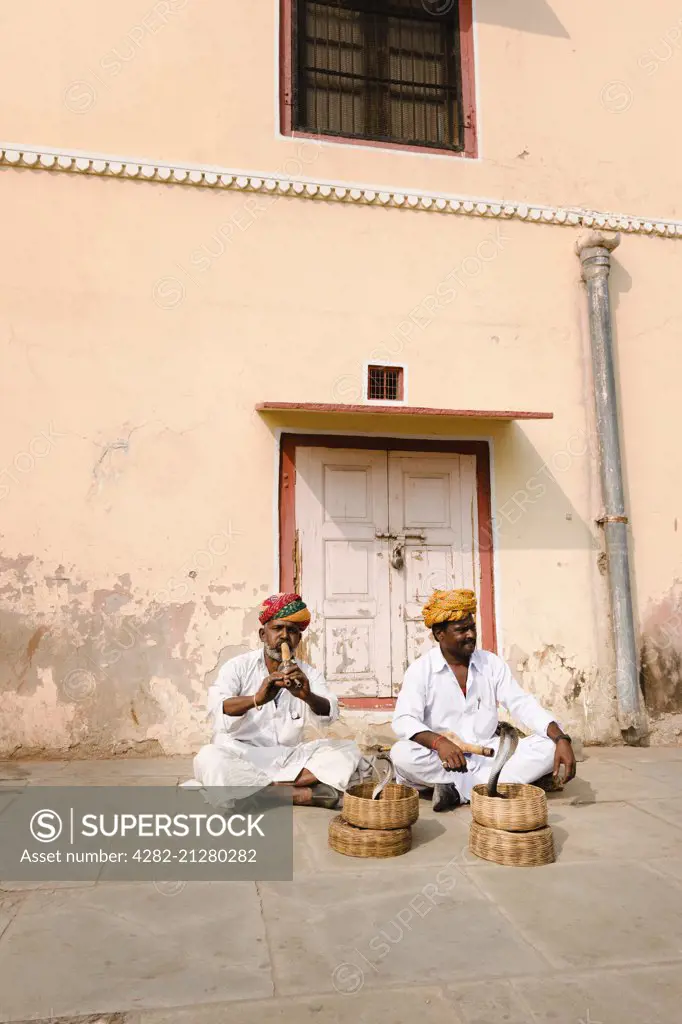 Snake charmers outside the Jaipur City Palace and Museum.