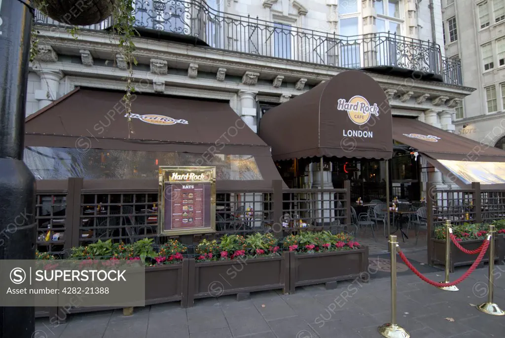 England, London, Piccadilly. Hard Rock Cafe. Founded in 1971 by Isaac Tigrett and Peter Morton, the first Hard Rock Cafe opened near Hyde Park Corner, in a former Rolls Royce car dealership showroom.