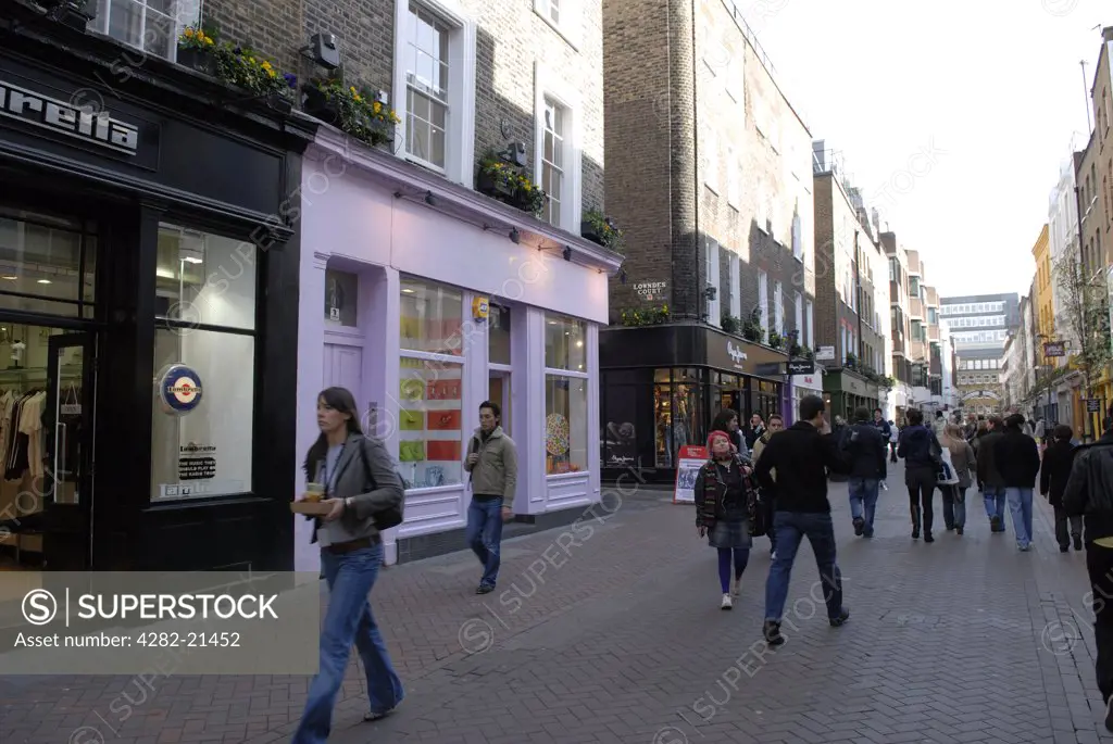 England, London, Carnaby Street. Shoppers walking along Carnaby Street.