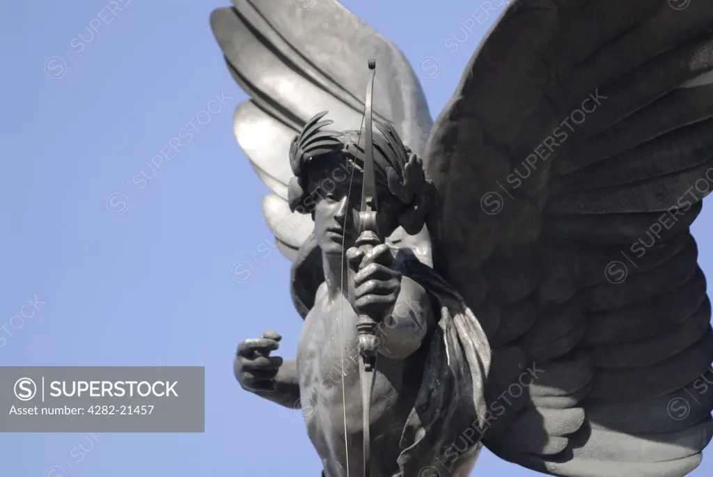 England, London, Piccadilly Circus. Detail of the statue of Eros. Unveiled in 1893 and originally called the Shaftesbury Monument, this aluminium statue was erected as a memorial to the philanthropist Lord Shaftesbury.