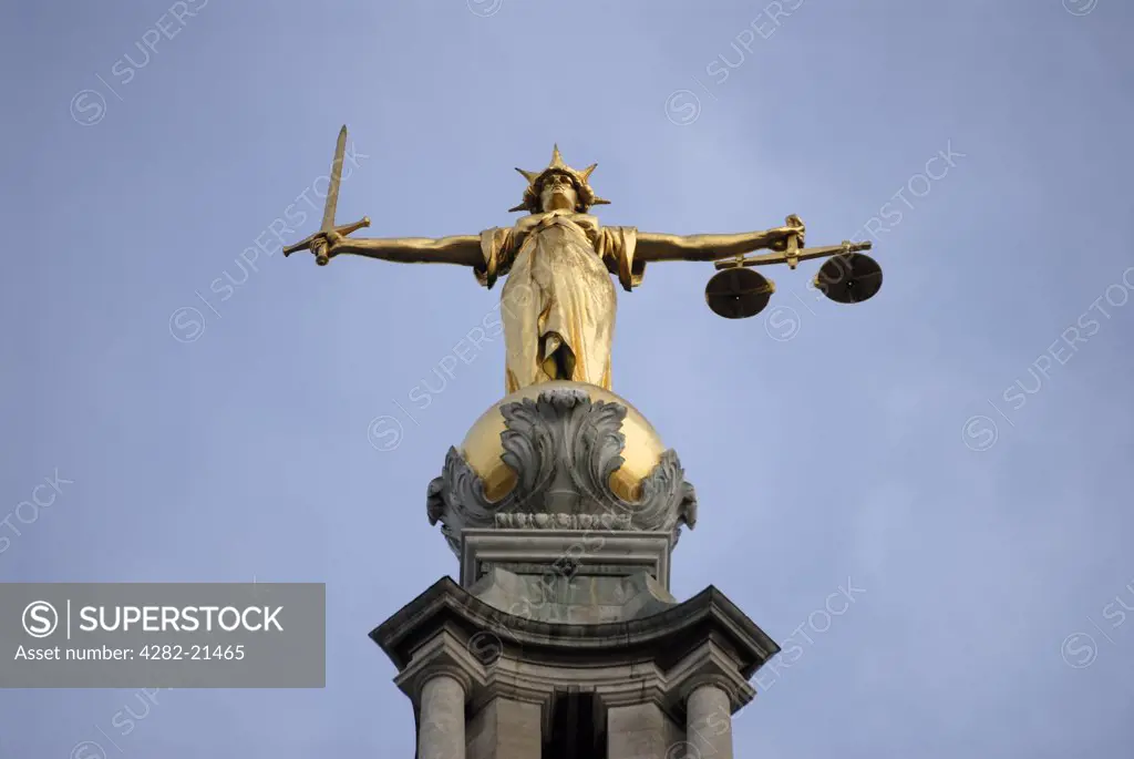 England, London, The Old Bailey. Statue of Lady Justice atop the Old Bailey building.