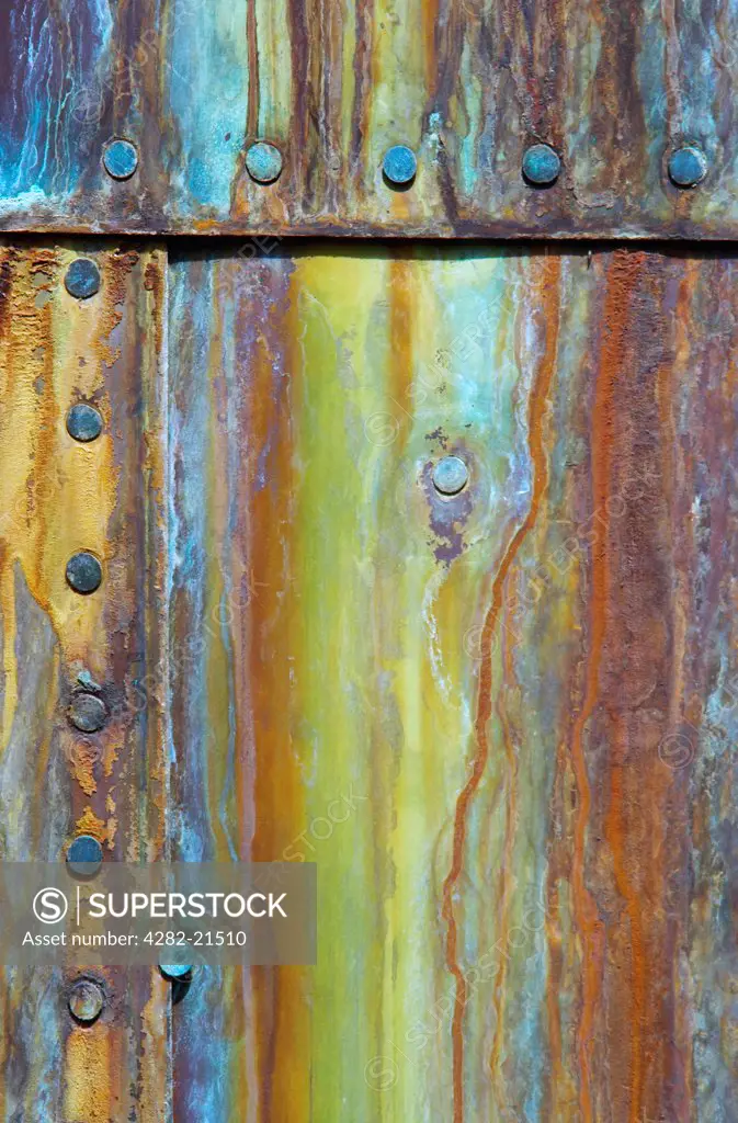 England, London, Greenwich. Abstract of corroded copper hull plate of the Cutty Sark. On 21st May 2007, a fire devastated the world's most famous ship and restoration work could last years.