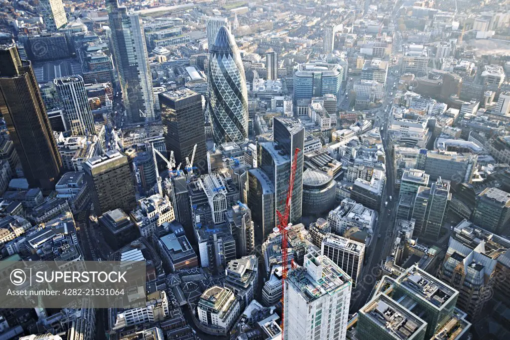 Aerial view of the city of London showing the Gherkin and Lloyds of London.