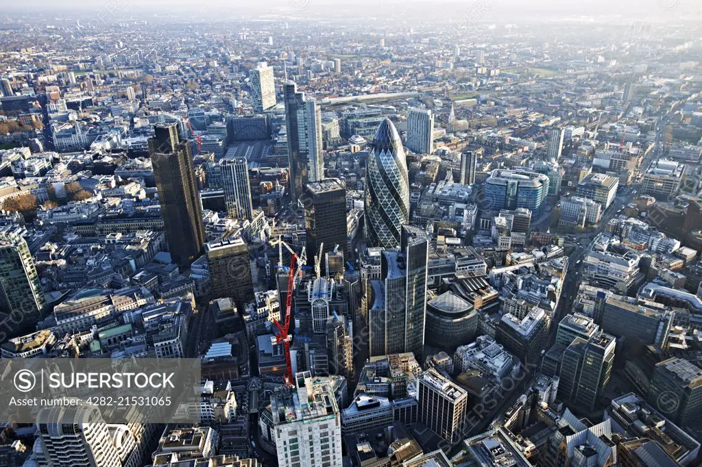 Aerial view of the city of London showing the Gherkin and Lloyds of London.