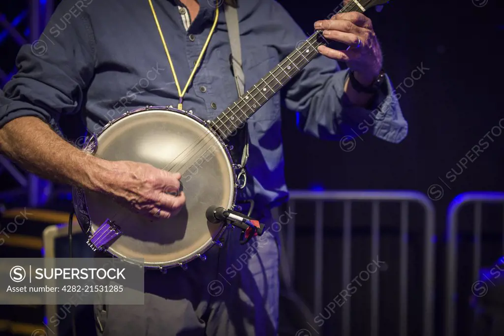 A banjo player performing.