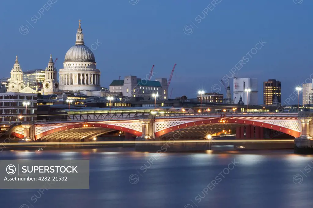 England, London, South Bank. Blackfriars Bridge and St Paul's at night.