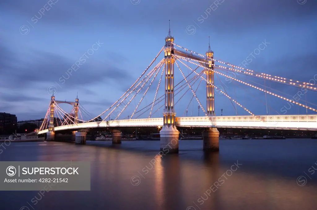 England, London, Chelsea. Albert Bridge at night.