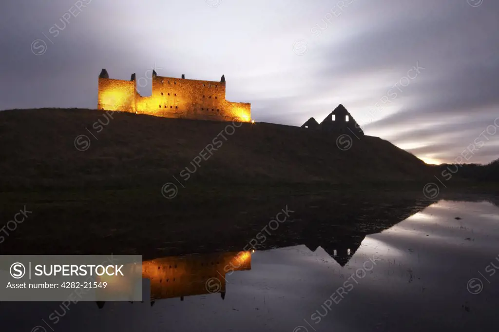 Scotland, Invernesshire, Kingussie. Ruthven Barracks at dusk. The castle that once stood on the site of the barracks, was said to be haunted by its notorious lord, who was trapped in limbo playing cards with the Devil.