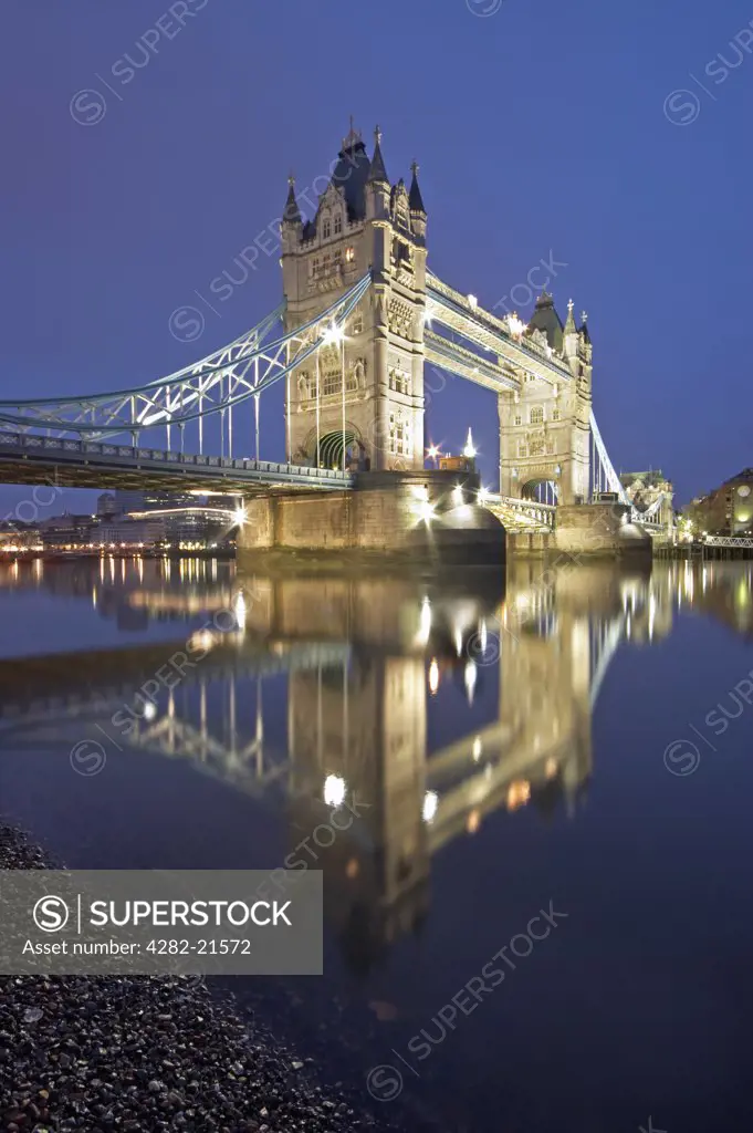 England, London, Tower Bridge. Tower Bridge at night. Completed in 1894, it took eight years, five major contractors and the relentless labour of 432 construction workers to build Tower Bridge.