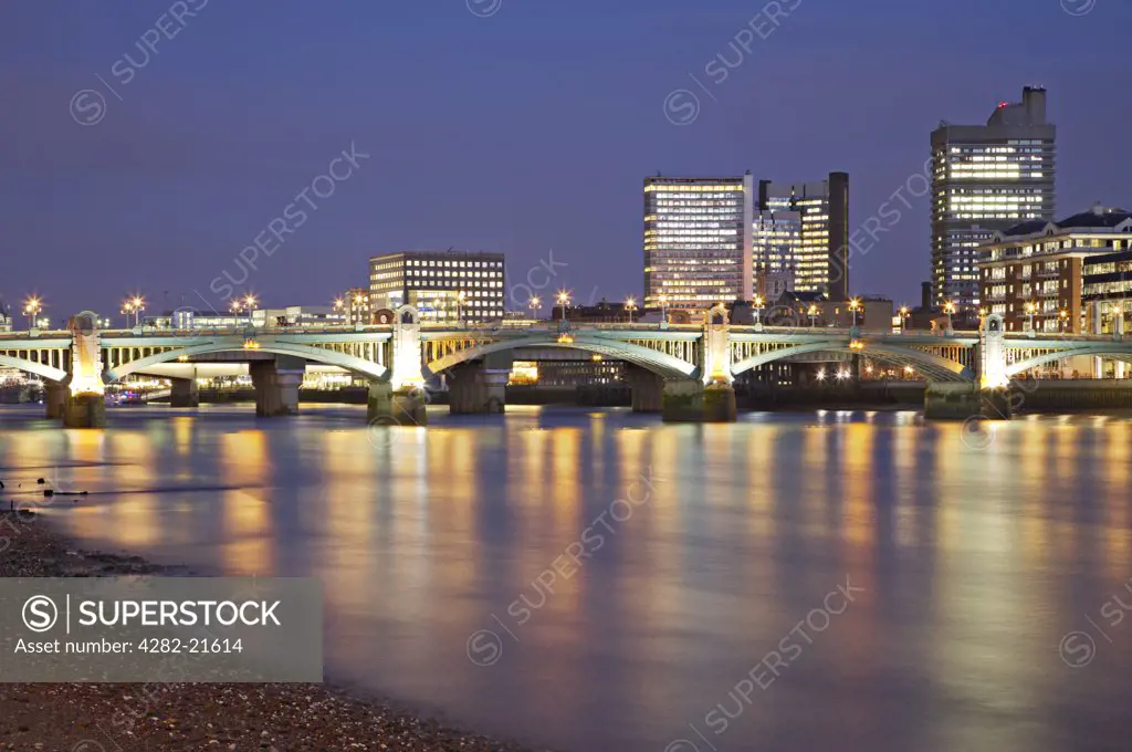 England, London, Southwark Bridge. Southwark Bridge illuninated at night.