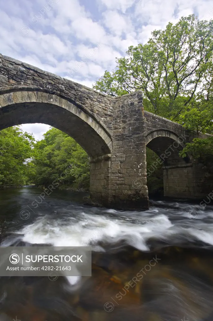 England, Devon, Dartmoor. A bridge over a stream in Dartmoor.