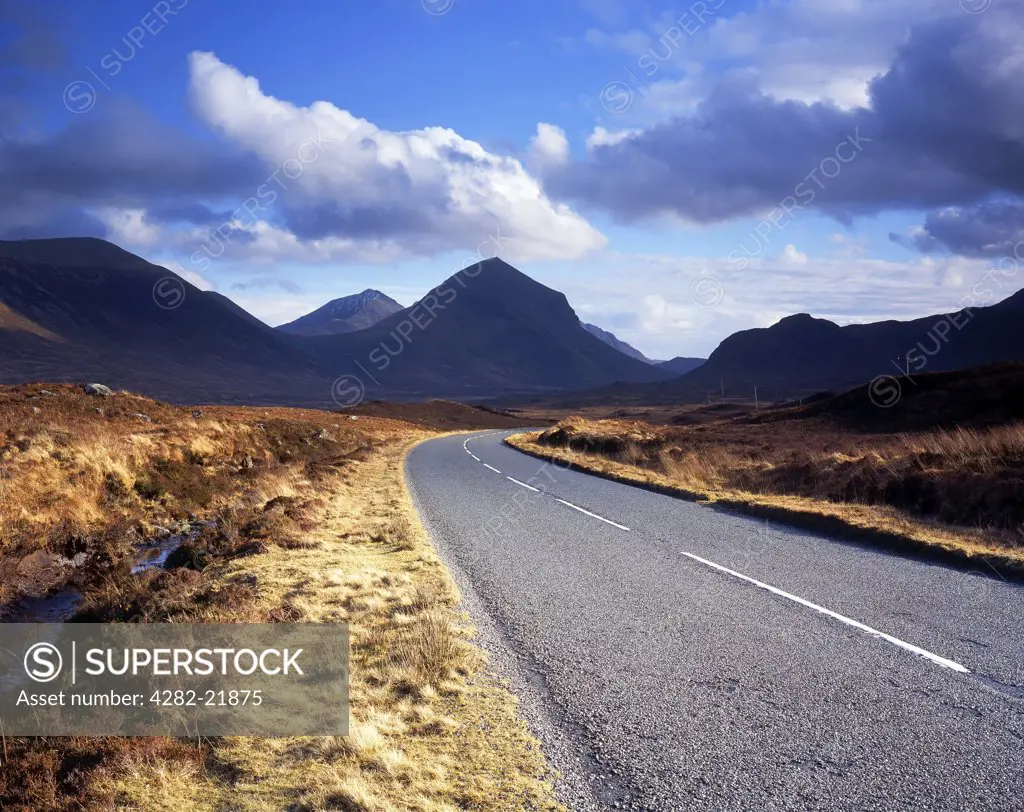Scotland, Highland, Portree. A road leading towards the Cuillin mountains on the Isle of Skye.