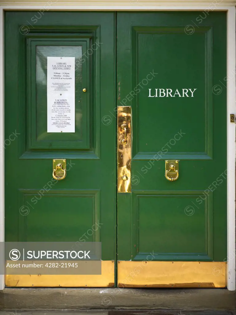 England, Cambridgeshire, Cambridge. Emmanuel College library doors.