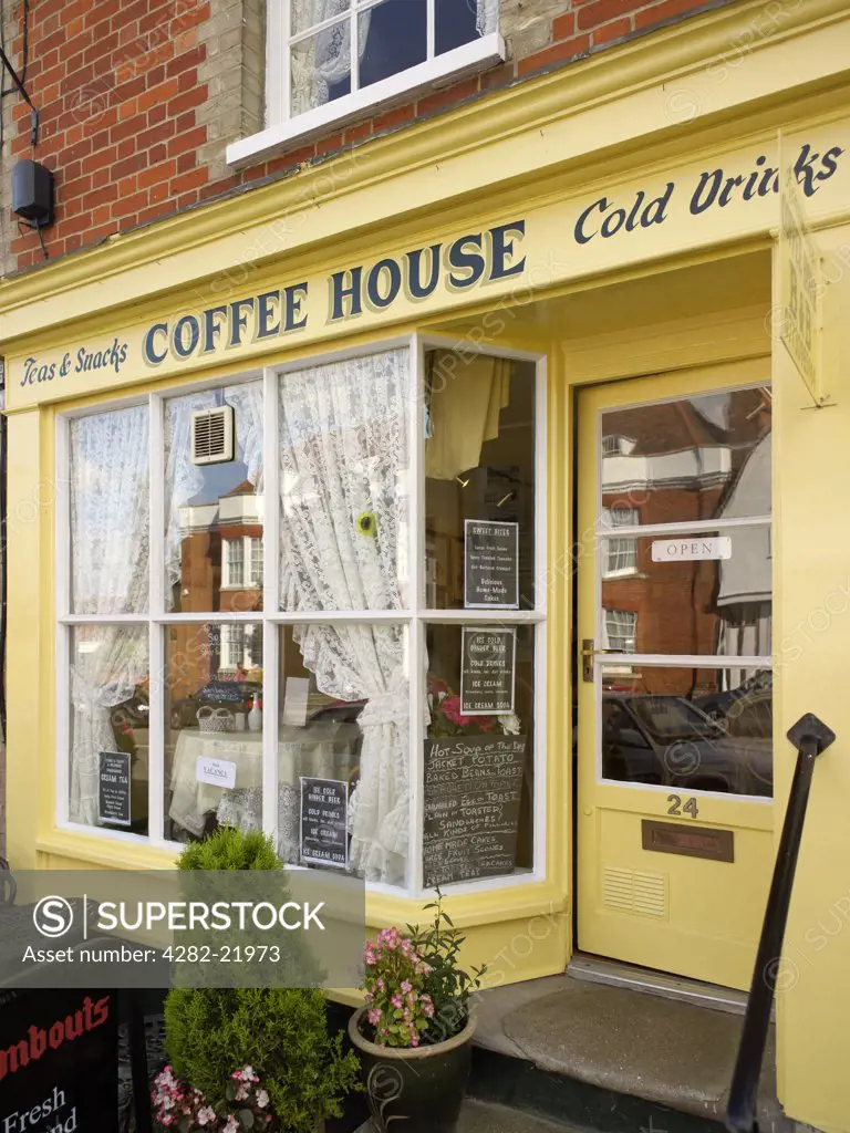 England, Suffolk, Lavenham. An English village coffee house. Away from the bustle of the cities, coffee houses in rural communities are for locals and tourists to drink tea, coffee and beverages, snack on a pastry and chat.