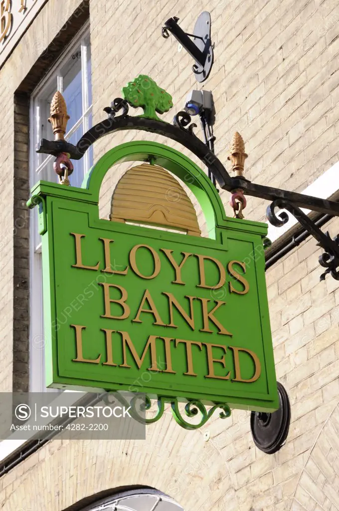 England, Suffolk, Bury St Edmunds. An old fashioned Lloyds Bank Limited sign hanging outside a branch of the bank in Bury St Edmunds.