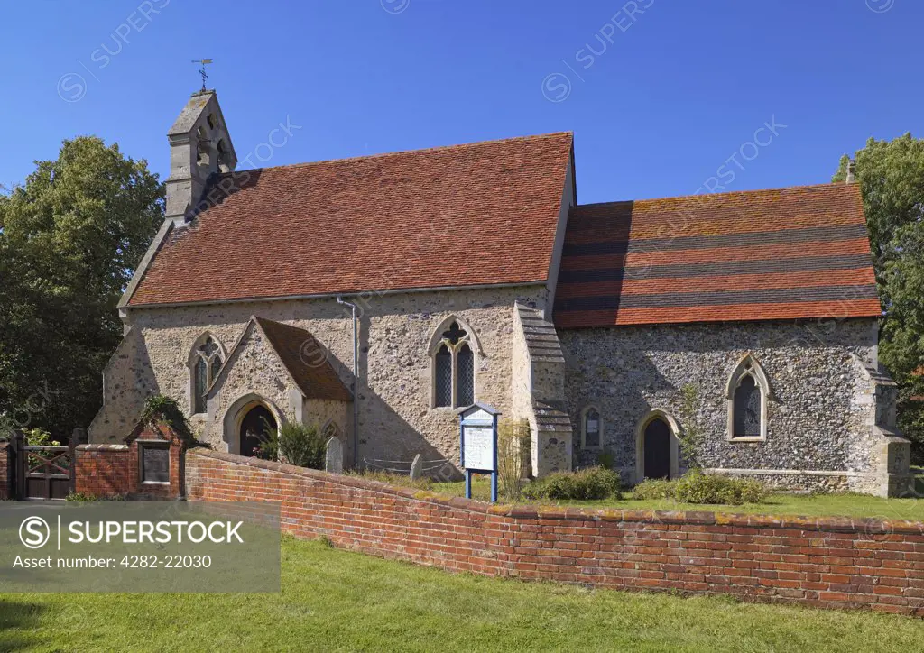 England, Essex, Dengie. St James Church in Dengie. The walls are of septaria, flint and pebble rubble, with Roman and yellow brick.