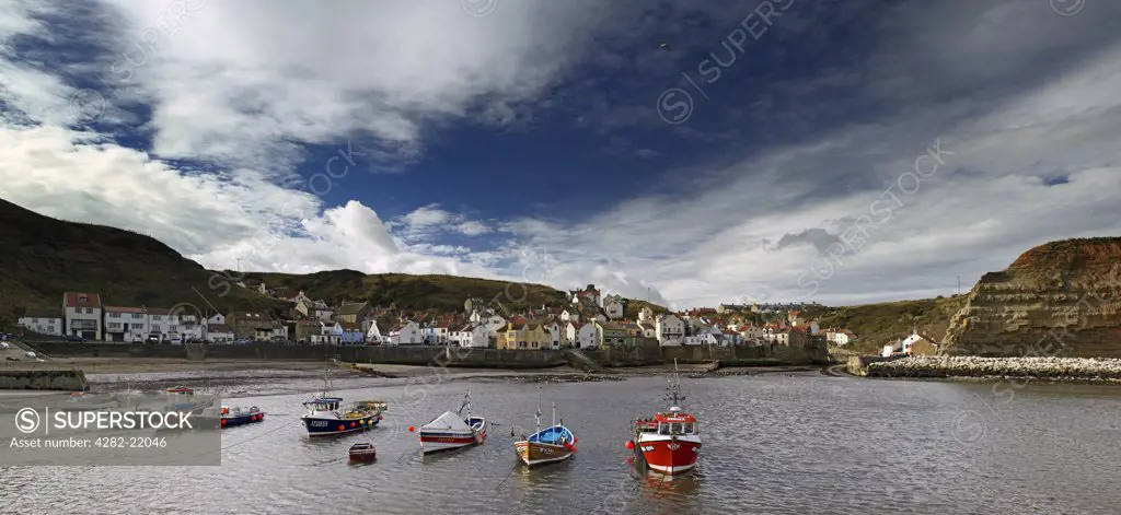 England, North Yorkshire, Staithes. A view toward the port of Staithes. It derives its name from the word staithe the literal interpretation of which is 'landing place'.