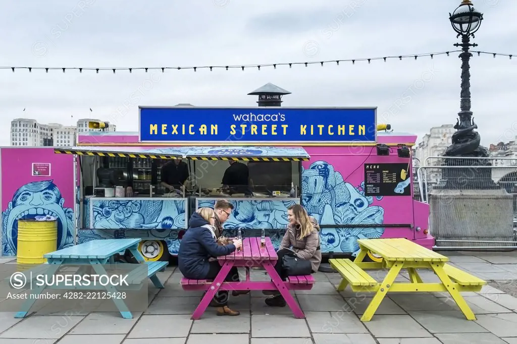 A Wahaca Mexican Street Food catering van truck on the Embankment in London.