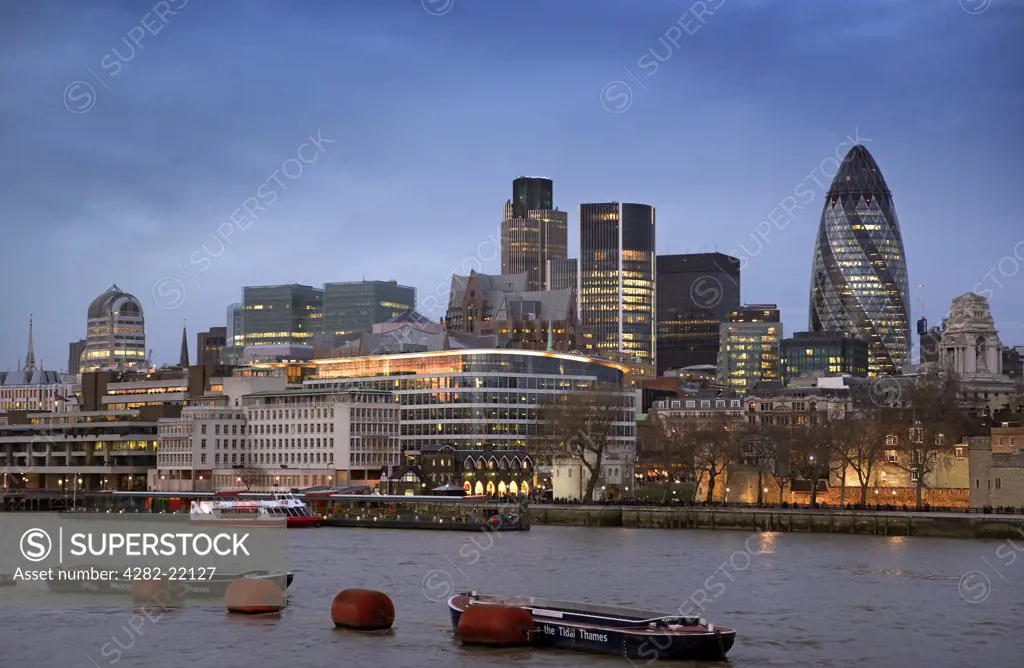 England, London, The City. Evening view of the City of London from south of the River Thames.