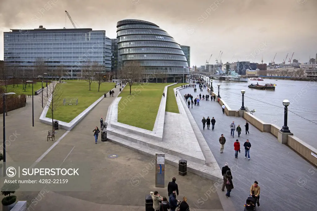England, London, South Bank. The Queen's Walk view towards City Hall and Lambeth.