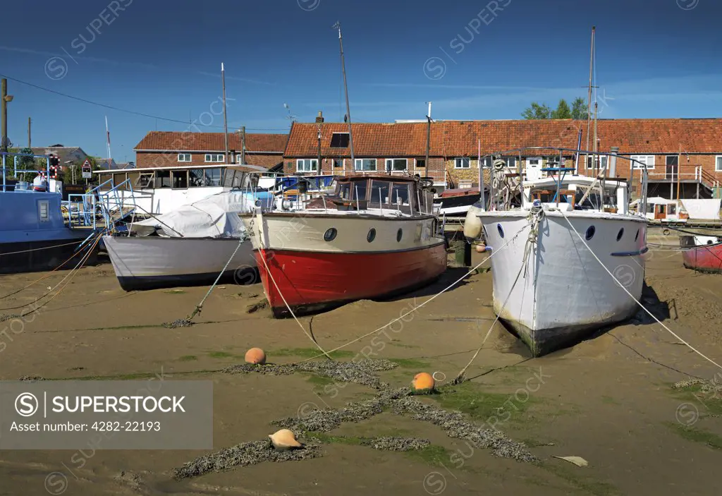 England, Suffolk, Woodbridge. Old Boats near Tide Mill in Woodbridge.