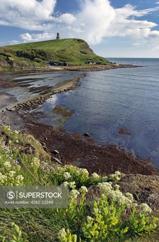 England, Dorset, Kimmeridge Bay. The Clavell Tower, a historic landmark in Kimmeridge Bay built in 1830, restored and relocated 25 metres from its original position to stop it falling into the sea.