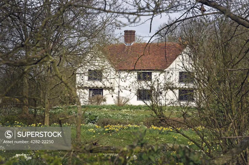 England, Essex, Saffron Walden. An old house in Elmdon in Spring.