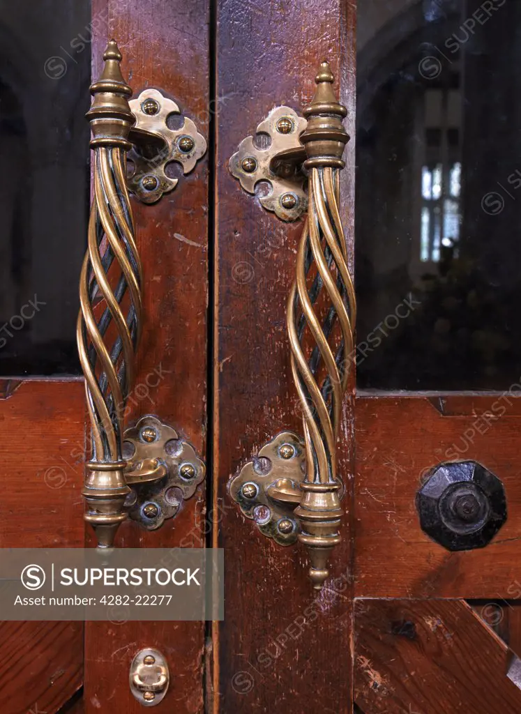 England, Hertfordshire, Barkway. Ornate door handles in St. Mary Magdalene Church in Barkway.