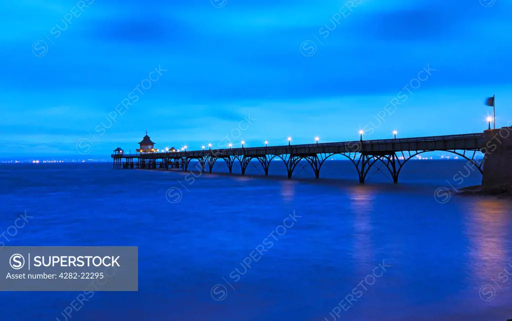 England, Somerset, Clevedon. Clevedon pier in the Severn Estuary just before dawn.