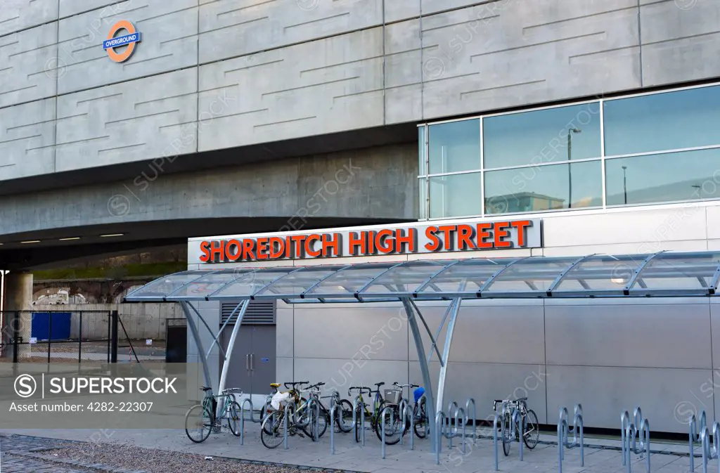England, London, Shoreditch. A bicycle rack outside Shoreditch High Street overground railway station.