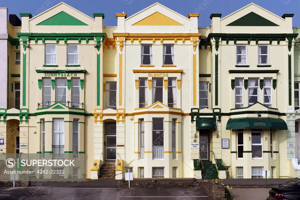 England, Devon, Paignton. Colourful hotels on the seafront at Paignton on the English Riviera.